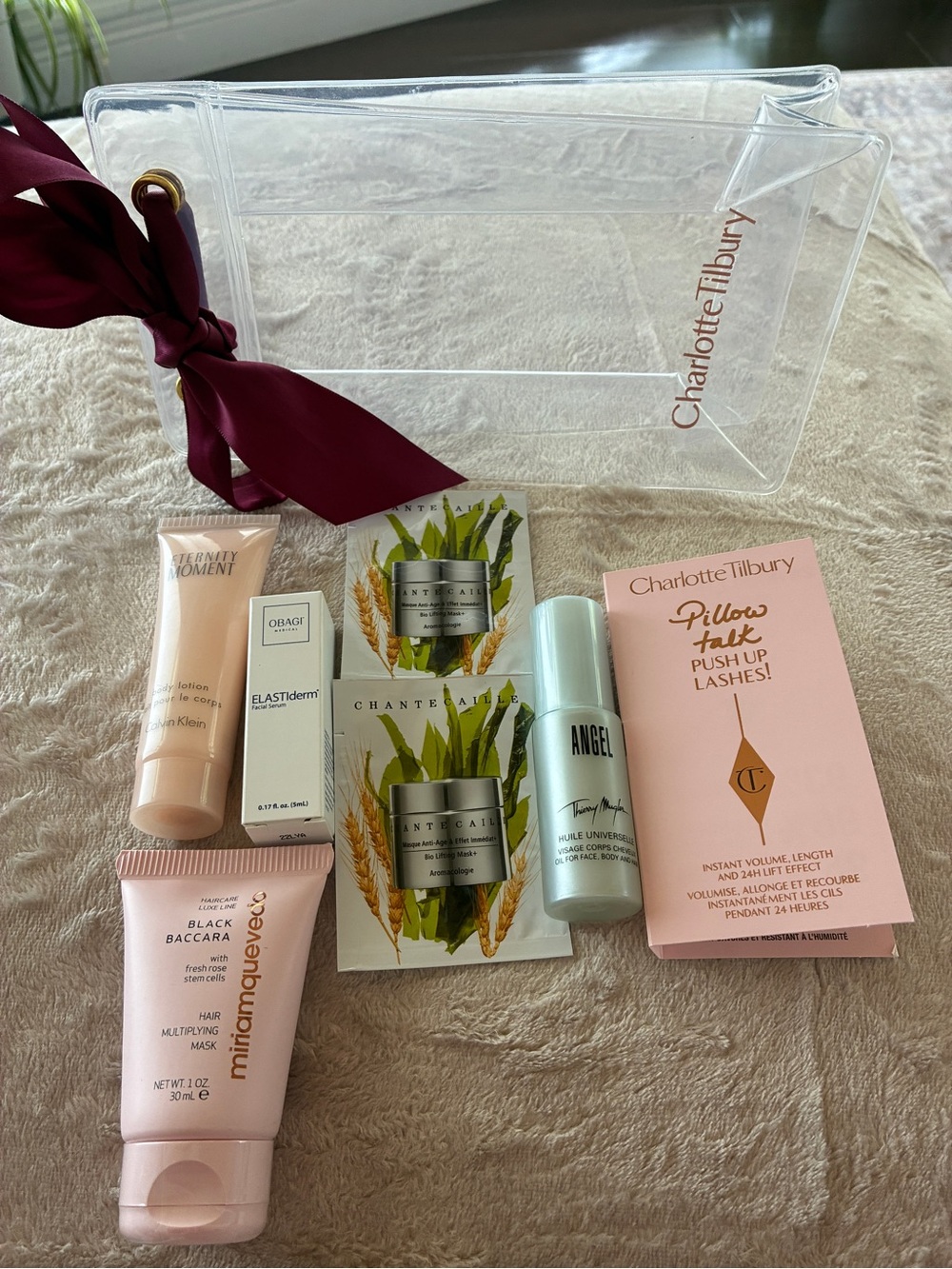 LUXURIOUS 7 pc set including Charlotte Tilbury with Burgundy Bow. 7 piece LUX